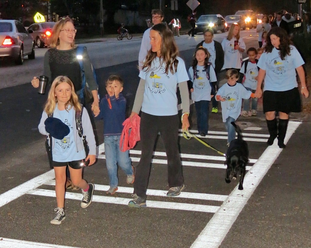 File photo: Students who live in the Lenox Place neighborhood walk to Oakhurst Elementary. The neighborhood has since been rezoned to Westchester, which will reopen this fall. 