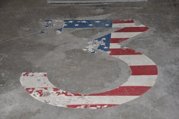 This stenciled No. 3 on the floor of the Avondale Estates fire station is one of many things around the station that needs fixing up. 