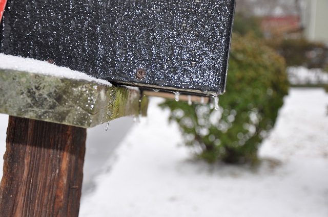 Ice hanging from a mail box. 