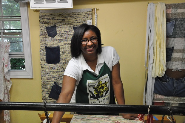 New to weaving, Donna loves learning something new and is inspired by everything that is around her, music, books, beauty and friends.  Donna is in night school and wants to help victims of domestic violence. Photo courtesy of reloom.org