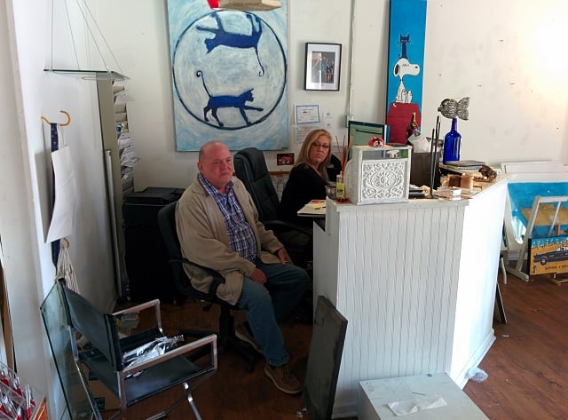 Bill Bibb and Vicki Elders wait for customers on a Saturday afternoon. Bibb owns The Seen Gallery in downtown Decatur, Ga. The business will close soon. Photo by: Dan Whisenhunt