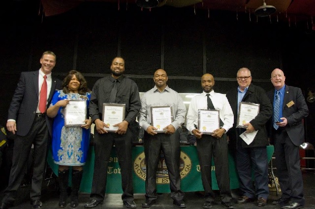 City Manager Clai Brown presents associates with special recognition awards. From left to right: Brown, City Clerk Juliette Sims-Owens, Parks and Recreation Supervisor Oscar Griffin, Public Works Associate Shawn Luttery, Sanitation Supervisor Harold Anderson, Finance Director Ken Turner and Mayor Ed Rieker. Photo and caption provided by Avondale Estates. 