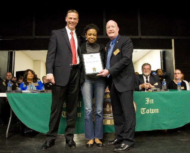 Good Karma Coffee House owner Sharonda Frazier accepts a business special recognition award. Photo and caption provided by the city of Avondale Estates.