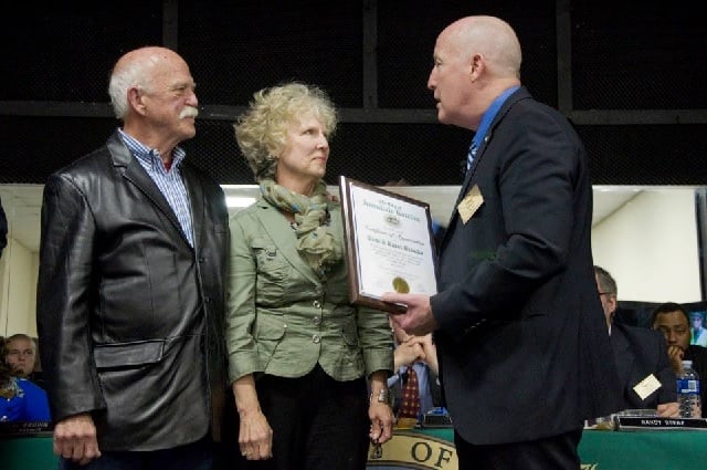 Longtime residents Tom and Carol Brooks, who are moving to Oregon next month, accept a special recognition award thanking them for their service to Avondale. Photo and caption provided by Avondale Estates.