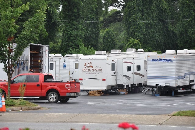 Film trucks in the Avondale Estates First Baptist Church Parking Lot. Photo by Dan Whisenhunt
