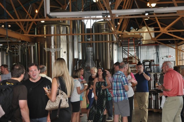 June 12, 2014: Guests mingle at the grand opening of the Wild Heaven brewery. Photo by Dan Whisenhunt
