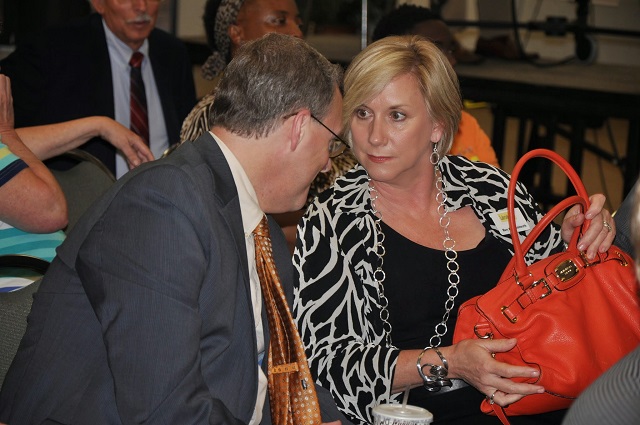 Briarcliff Initiative member Allen Venet left, talks with Lakeside City Alliance Chairwoman Mary Kay Woodworth during a July 2 DeKalb Operations Task Force meeting. The two groups will work together to incorporate a new city in DeKalb. File Photo by Dan Whisenhunt