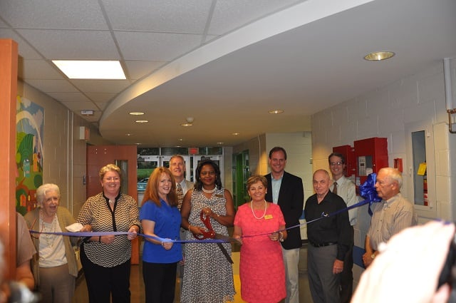 City Schools of Decatur Board of Education members cut the ribbon during a July 31 reopening ceremony for Westchester Elementary in Decatur. Photo by Dan Whisenhunt