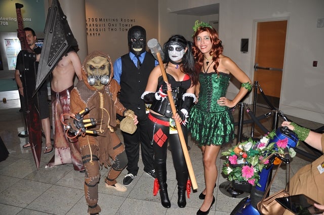 Left to right: Scare Crow, Black Mask, Harley Quinn and I have no freakin' idea. 