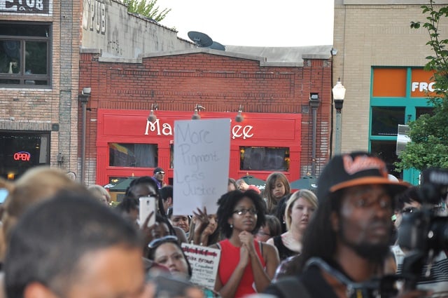 A crowd gathered at the Decatur, Ga. courthouse on Aug. 14 in response to the shooting death of an unarmed black teenager in Missouri. Photo by Dan Whisehunt