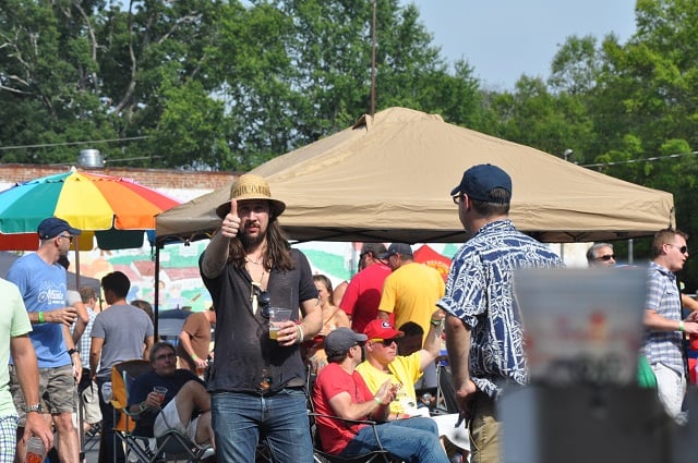 This man judged the festival to be a success, as indicated by his "thumbs up" gesture. Photo by Dan Whisenhunt