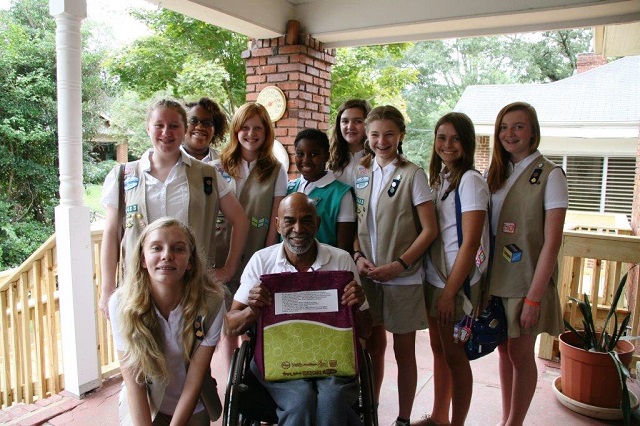 Members of Decatur Girl Scout Troop Decatur Troop 28433 visited resident Eli Dodson on Aug. 1 as part of the Purple Farmer's Market project. Photo submitted by Sgt. Jennifer Ross