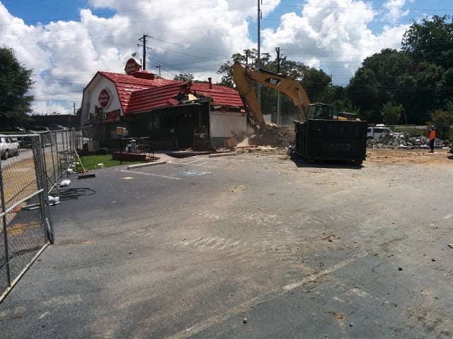 Crews knocking down the Dairy Queen building in Decatur, Ga. Photo by Dan Whisenhunt