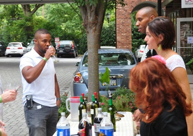 Drinking wine at Kirkwood Station, which is located along Hosea Williams Drive. File photo from 2014 Wine Stroll