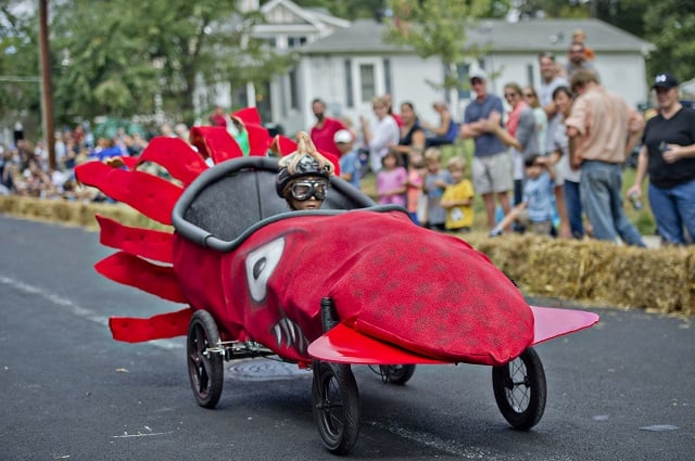 Photo: Jonathan Phillips Sage Powell steers a squid down Madison Ave. in Decatur during the 4th annual Madison Ave. Soap Box Derby on Saturday, September 27, 2014.