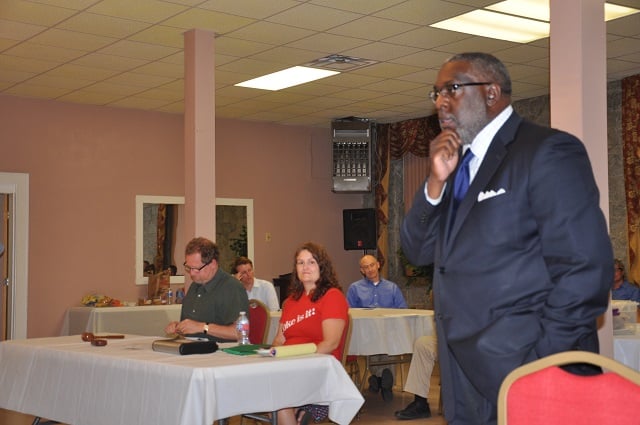 Mitchell King, region manager for Georgia Power, speaks to the Kirkwood Neighbors' Organization on Sept. 10. Photo by Dan Whisenhunt