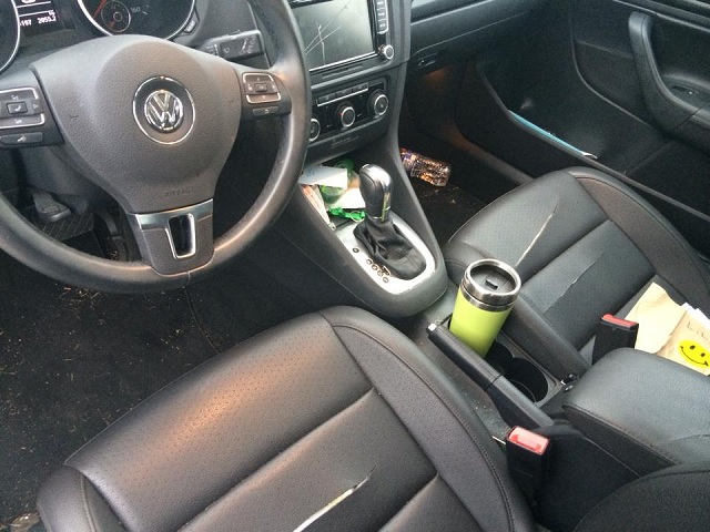 Photo of  slashed car seats provided by Medlock Park residents