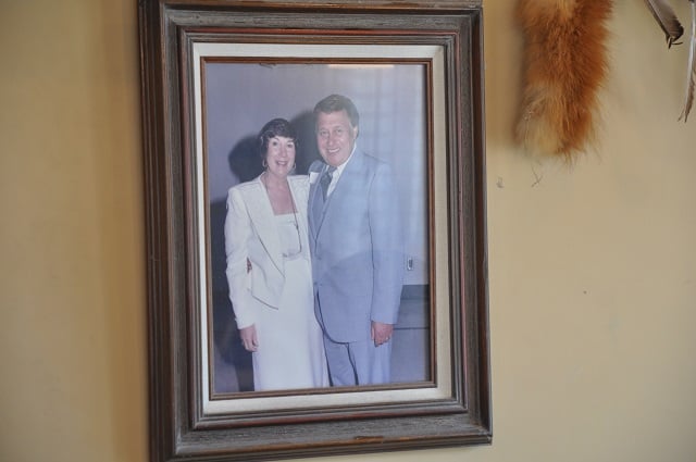 A photo of Peggy, left, and Ray Belcher hangs on the walls of Ray's Indian Originals in Avondale Estates. Photo by Dan Whisenhunt