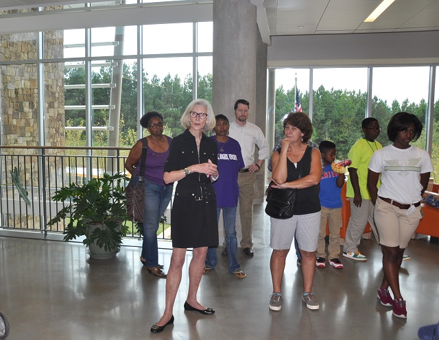 Cynthia Kuhlman, Chair of the Drew Charter School Board of Directors speaks during a tour of the academic building at the Charlie Yates Campus. Photo by Dan Whisenhunt