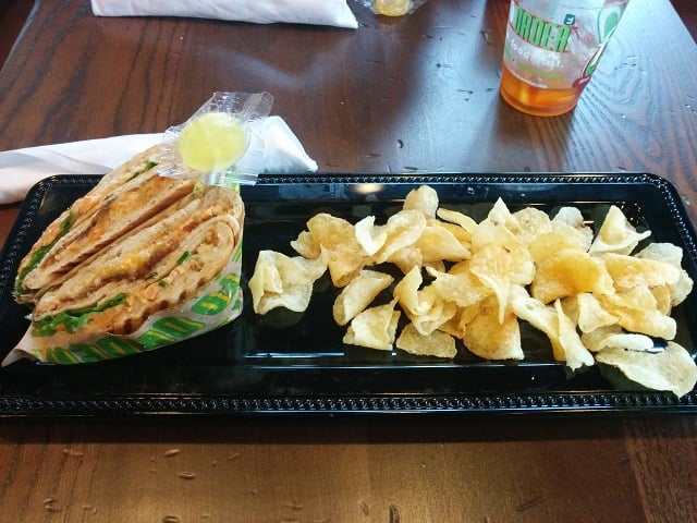 A slow roasted pork panini and chips from Fresh To Order in Decatur, Ga. 