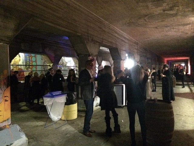 Masqueraders milling around in the Krog Street Tunnel on Oct. 25. Photo by Kim Hutcherson