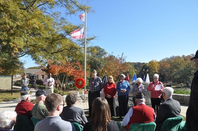 Members of the American Legion Post in Avondale Estates paid tribute to our veterans during a ceremony at the Decatur Cemetery on Nov. 11. Photo by Dan Whisenhunt