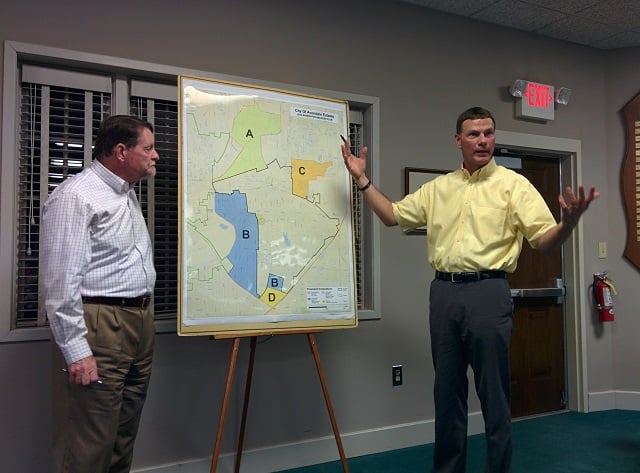 Mayor Terry Giager, left, and City Manager Clai Brown, right, present a proposed annexation map for the city of Avondale Estates. Photo by Dan Whisenhunt