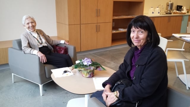 Anna Alexander and Gillian Rosenberg enjoy the new lobby of the Central DeKalb Senior Center. Photo by Dena Mellick