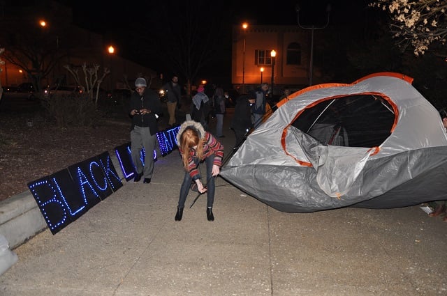 Activists set up tents outside the DeKalb County Courthouse. Photo by Dan Whisenhunt