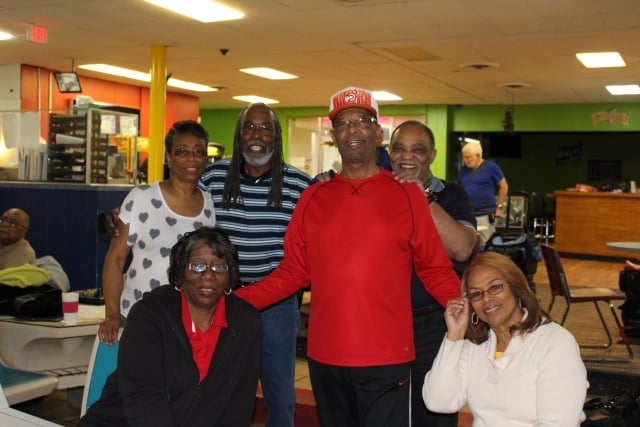 Members of the Friday 55 & Over league at Suburban Lanes say the group has led to a lot of friendships. Photo by Dena Mellick
