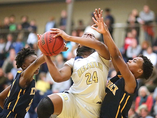 This is Janay Williams grabbing one of her 22 rebounds against Kendrick on Tuesday. Photo by Rick Brozek. 