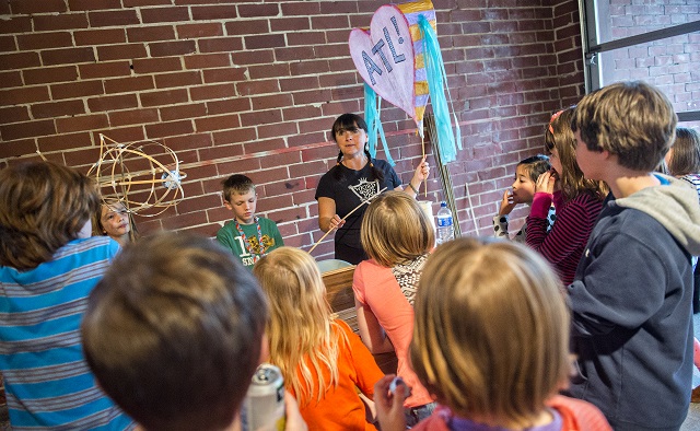 Photo: Jonathan Phillips Chantelle Rytter (center) leads a lantern workshop at Color Wheel Studio in Decatur on Friday, April 24, 2015. 12 workshops will be held before the Decatur Lantern Parade on May 15.