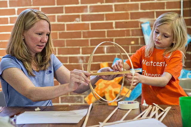 Photo: Jonathan Phillips Keri Powell (left) helps her daughter Natalie Marks with her bamboo lantern during a workshop at Color Wheel Studio in Decatur on Friday, April 24, 2015. 12 workshops will be held before the Decatur Lantern Parade on May 15.