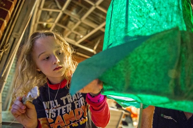 Photo: Jonathan Phillips Jude Harper Barcik pastes colored paper to her lantern during a workshop at Color Wheel Studio in Decatur on Friday, April 24, 2015. 12 workshops will be held before the Decatur Lantern Parade on May 15.