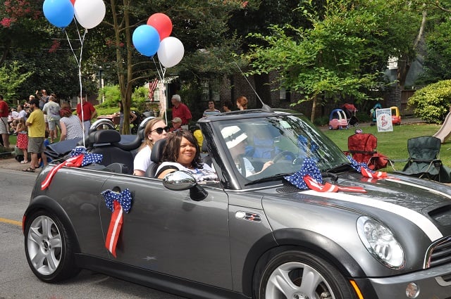 Juliette Sims-Owens riding in the 2014 Avondale Estates Fourth of July Parade. Photo by Dan Whisenhunt