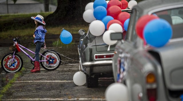 Sofie Plishka lines up to ride her bike in the Avondale Estates 4th of July Parade on Saturday. Photo: Jonathan Phillips