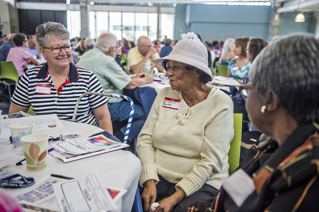 Pearleta Sterling (center) and Dawn Buannic participate in  the Community Action Planning Cafe Conversation in Decatur.  Photo: Jonathan Phillips