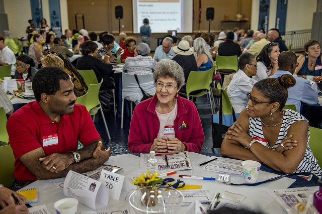 Daniel Walker (left), Mary Alice Kemp and Cele Blair get to know one another during  the Community Action Planning Cafe Conversation. Photo: Jonathan Phillips