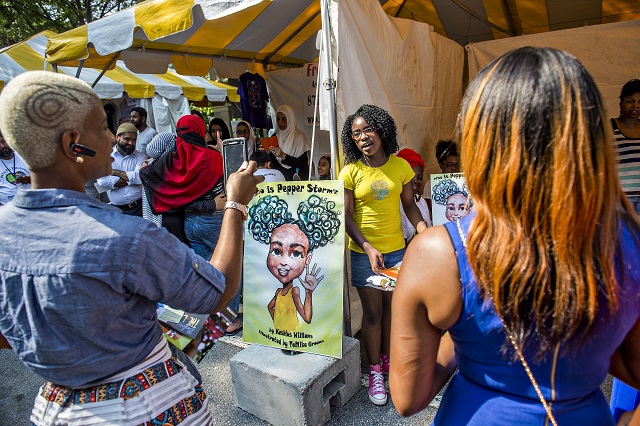 Promise Williams (center), talks about Pepper Storm, the character she inspired her mother to create, during the Decatur Book Festival on Saturday. Photo: Jonathan Phillips