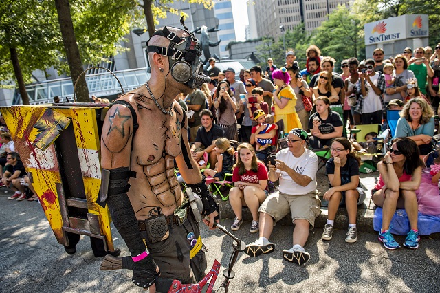 Dressed as Kreig from the Borderlands series, Joshua Bohn makes his way down Peachtree St. in Atlanta during the annual DragonCon Parade on Saturday. Photo: Jonathan Phillips