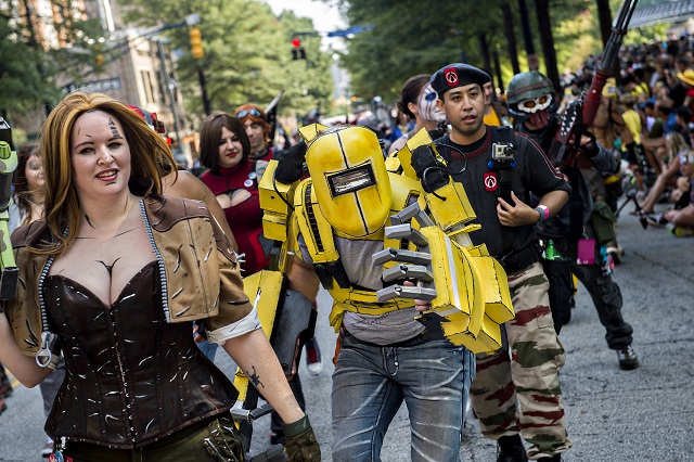 Justin Schwab marches down Peachtree St. in Atlanta during the annual DragonCon Parade on Saturday. Photo: Jonathan Phillips