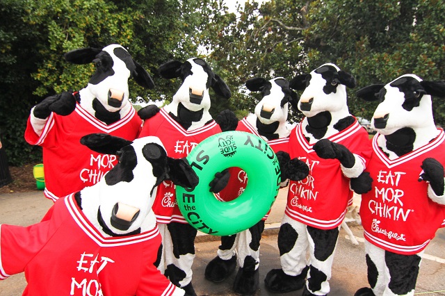 The Chick-fil-A cows stopped by to check out the slide. Photo by Travis Hudgons