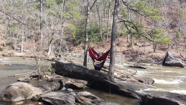A hiker decided to set up a hammock over Sweetwater Creek in the state park of the same name. Photo by Dena Mellick