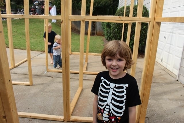 4-year-old Ronan O'Neal enjoys the empty maze. Jones-Mitchell said on Halloween it will be draped with black fabric and gauze and filled with animatronics that jump out at unsuspecting children trying to get to her front door for candy. Photo by Dena Mellick