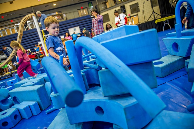Harrison Taylor (center) plays in foam blocks during the Atlanta Maker Faire in Decatur on Saturday.  Photo: Jonathan Phillips