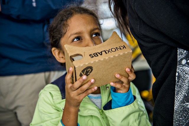 Mila Lorick plays around with Google Cardboard during the Atlanta Maker Faire in Decatur on Saturday. Photo: Jonathan Phillips