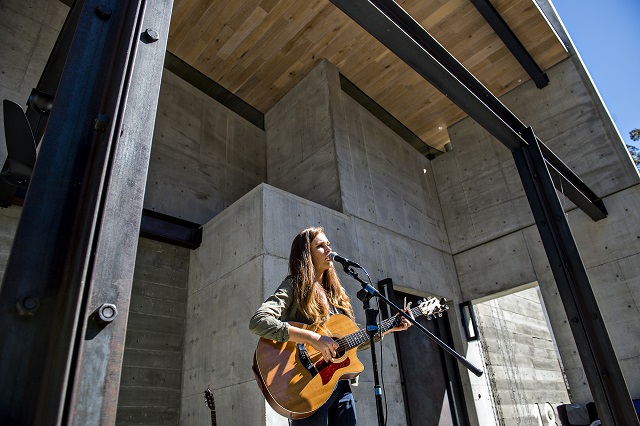 Sydney Rhame performs during the Oakhurst Porch Fest on Sunday. Photo: Jonathan Phillips