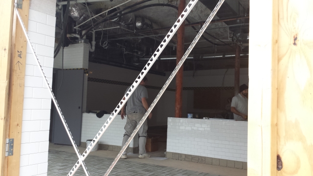 A white-tiled divider also has been installed in the Waffle House under construction in Decatur. Photo by Dena Mellick