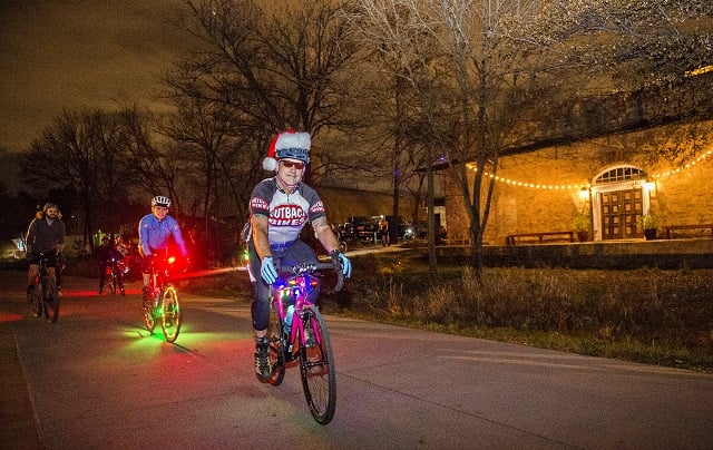 Pete Wicker rides down the Atlanta Beltline's Eastside Trail with around 50 other cyclists during the annual Atlanta Christmas Ride on Wednesday evening. Photo: Jonathan Phillips