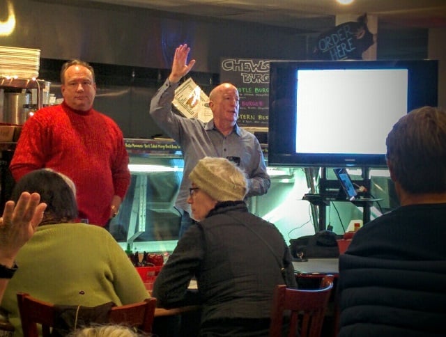John Ellingson, left, and Ed Rieker, right, give a presentation at The Market in Avondale Estates on Jan. 5. Photo by Dan Whisenhunt